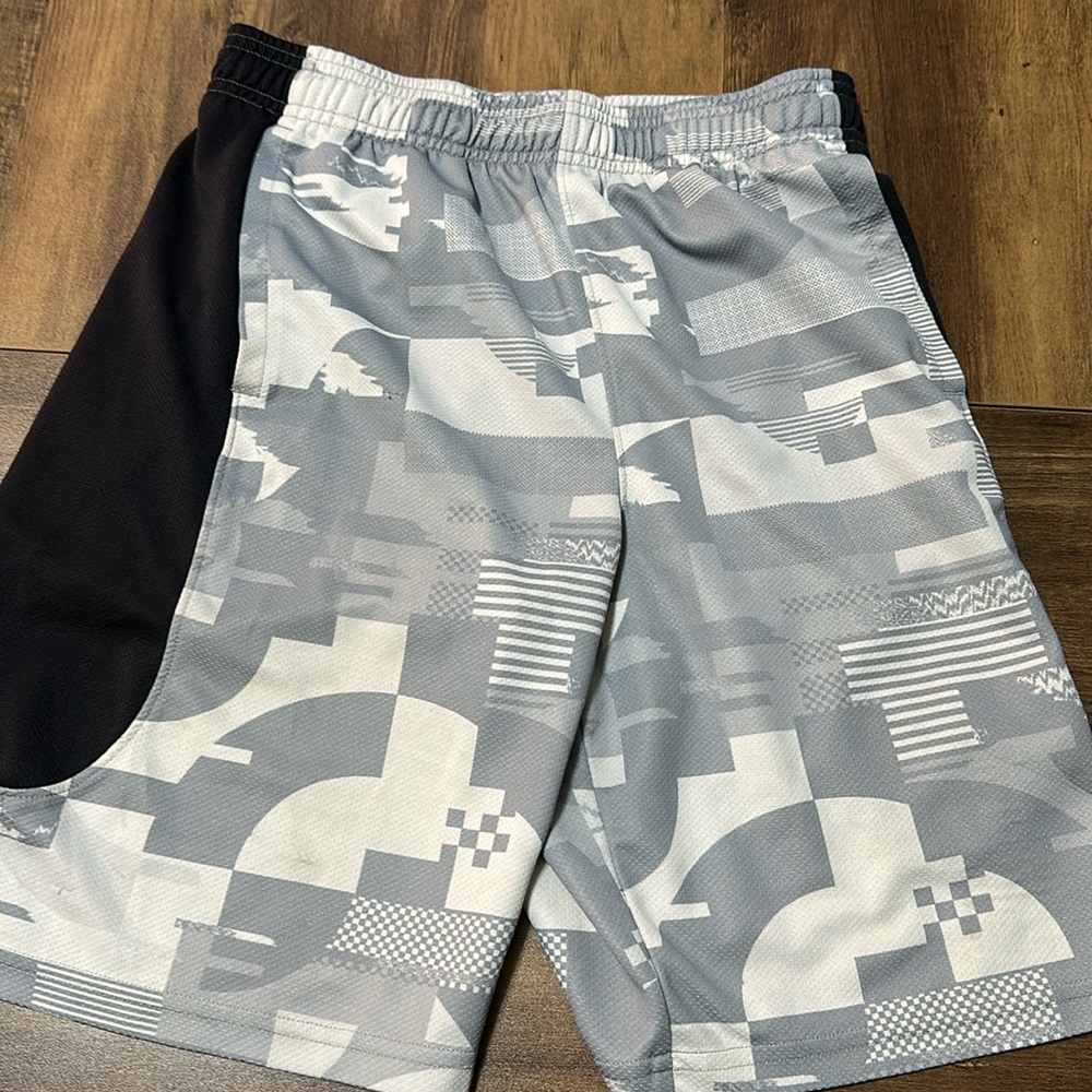 Under Armour, geometric camo shorts